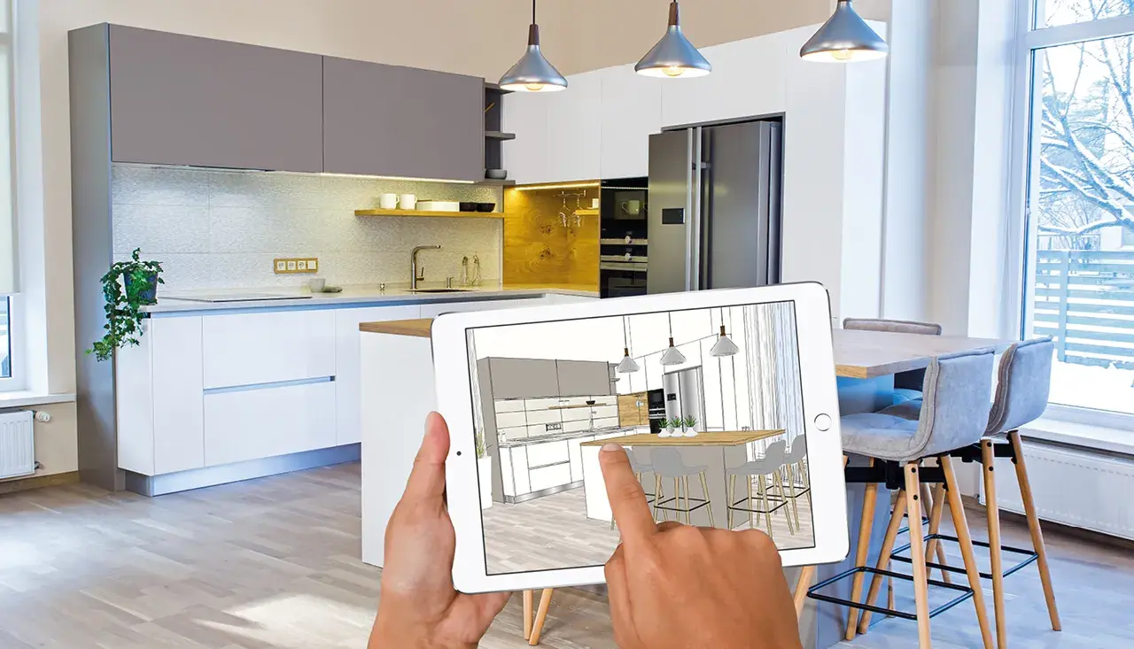 Stilvolle Küche in Grau mit Holzdetails und moderner Kochinsel, ergänzt durch digitale Küchenplanung auf Tablet für perfekte Visualisierung.